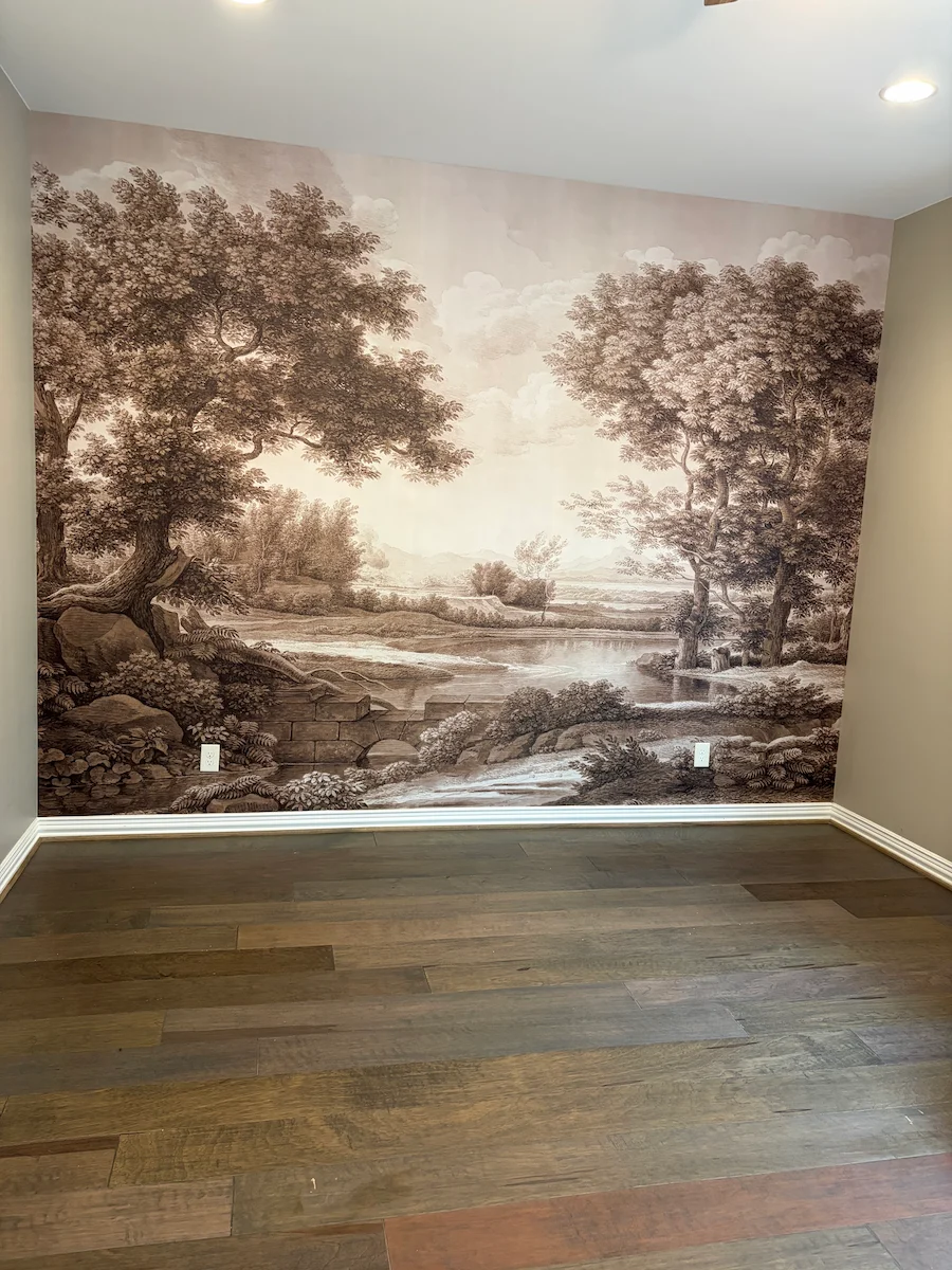 Woodland landscape mural creating a focal wall in a room